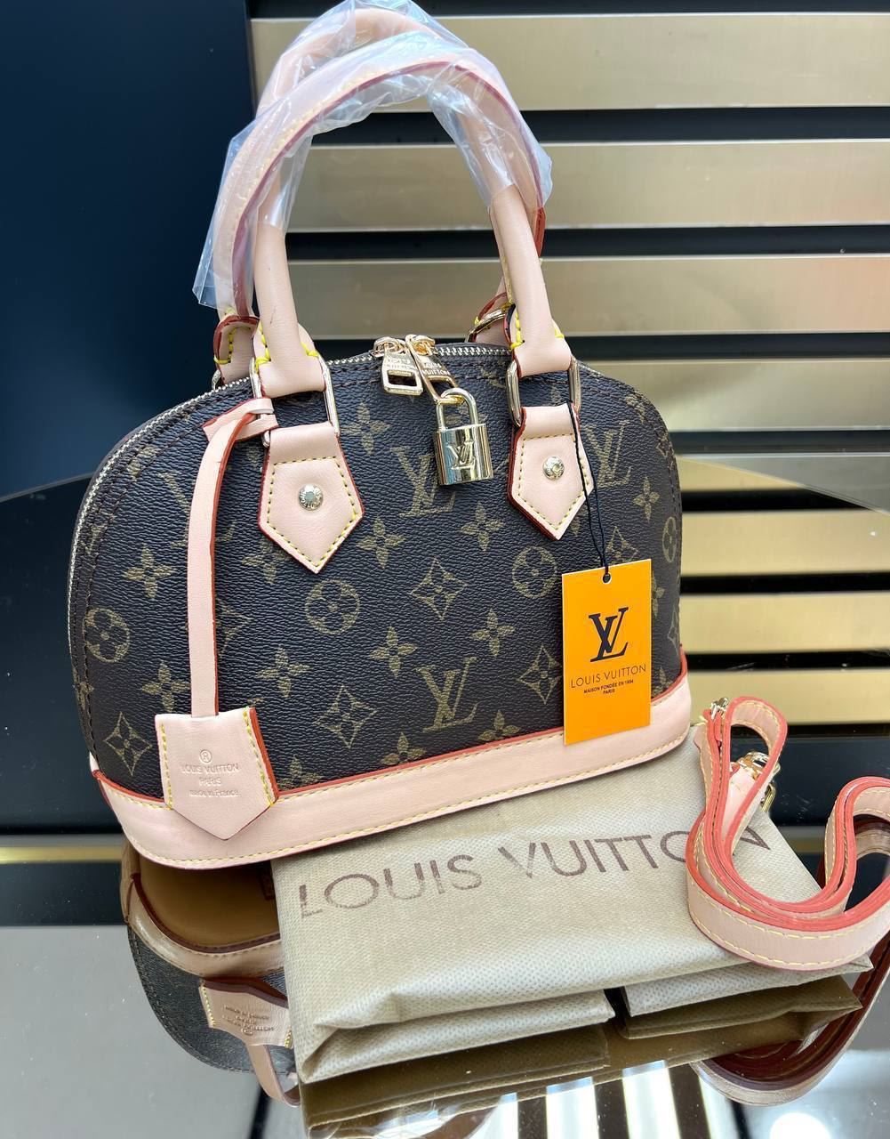 Bolso Louis Vuitton nano alma lona - Imagen 1