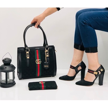 Conjunto de zapatos de tacón bolso y cartera Gucci - Imagen 1