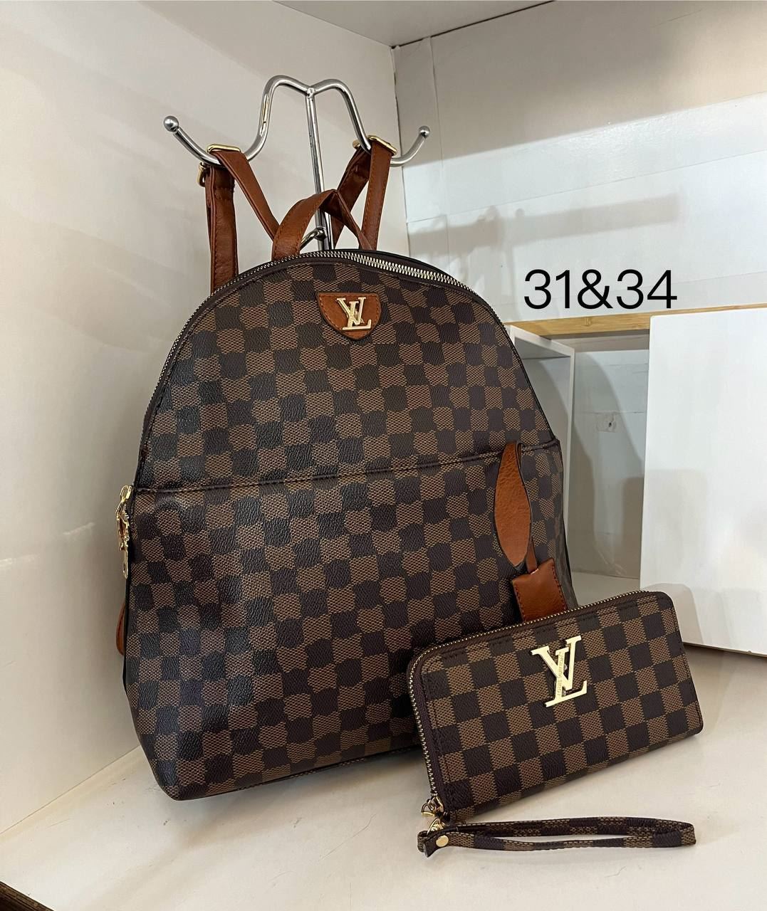 Conjunto mochila y cartera Louis Vuitton - Imagen 1