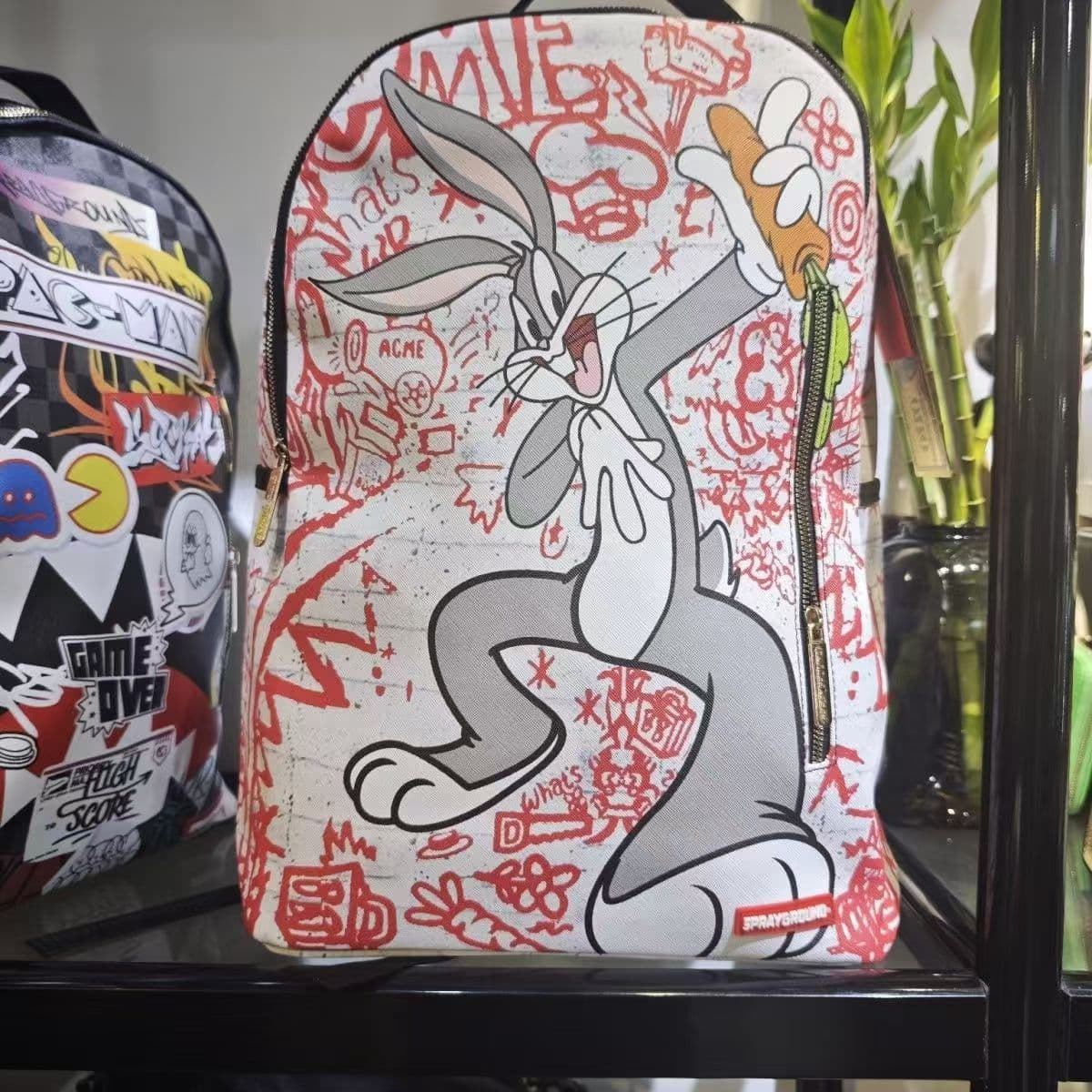 Mochila Sprayground Looney Tunes - Imagen 1