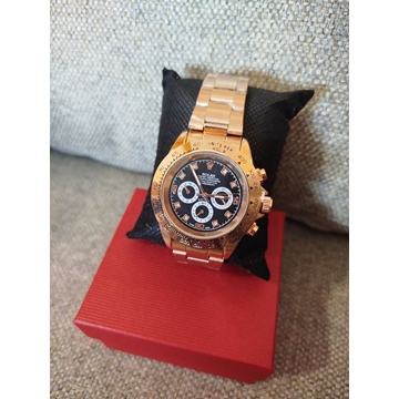 Reloj Rolex dorado - Imagen 1